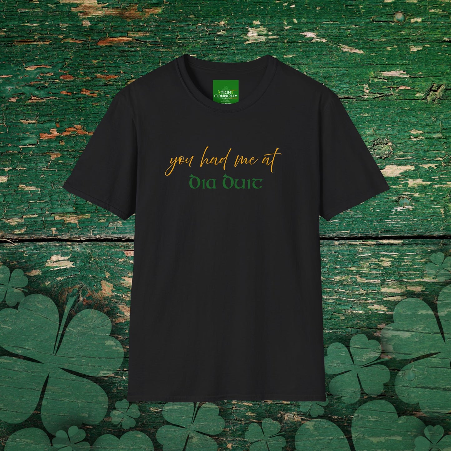 Black t-shirt with playful “You Had Me at Dia Duit” text, styled with Gaeilge charm — perfect for Irish language lovers.