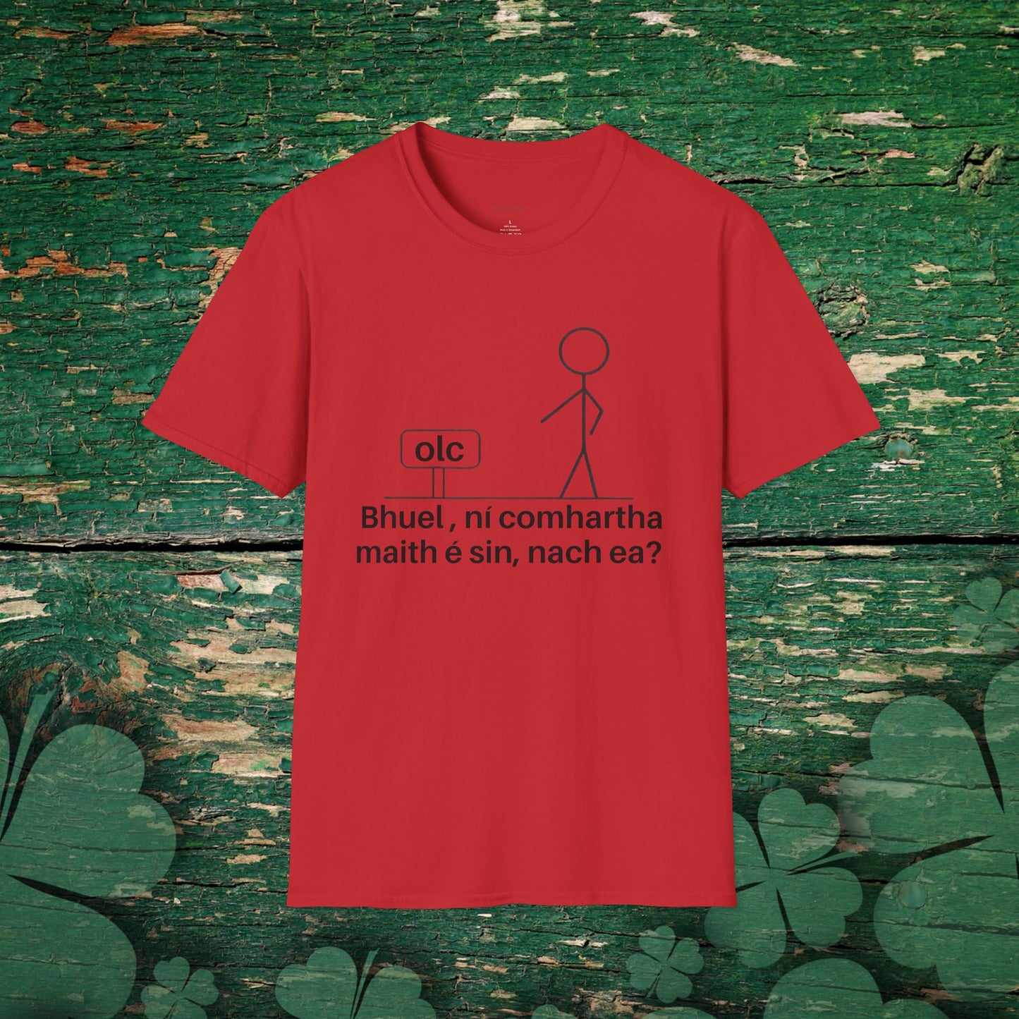 Irish language t-shirt with witty Gaeilge phrase “Bhuel, ní comhartha maith é sin, nach ea?” in black print on red shirt.